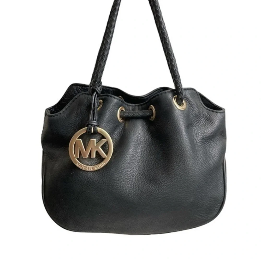 Michael kors mini black leather drawstring bag